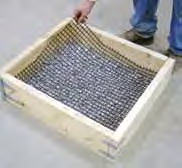 Geo-grid is added between layers of gravel. Geo-grid